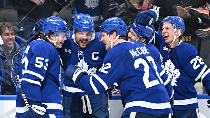 Jan 1, 2026; Toronto, Ontario, CAN; Toronto Maple Leafs forward Auston Matthews (34) celebrates with forwards Easton Cowan (53) and Nick Robertson (89) and defensemen Jake McCabe (22) and Troy Stecher (28) after scoring his third goal of the game against the Winnipeg Jets in the third period at Scotiabank Arena. Mandatory Credit: Dan Hamilton-Imagn Images Jan 1, 2026; Toronto, Ontario, CAN; Toronto Maple Leafs forward Auston Matthews (34) celebrates with forwards Easton Cowan (53) and Nick Robertson (89) and defensemen Jake McCabe (22) and Troy Stecher (28) after scoring his third goal of the game against the Winnipeg Jets in the third period at Scotiabank Arena. Mandatory Credit: Dan Hamilton-Imagn Images
