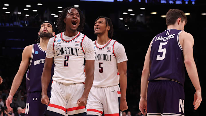 Mar 24, 2024; Brooklyn, NY, USA; Connecticut Huskies guard Tristen Newton (2) reacts against the