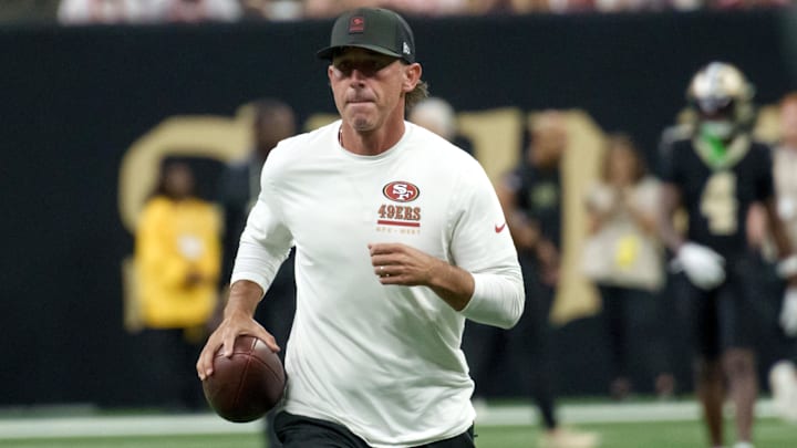 Sep 14, 2025; New Orleans, Louisiana, USA; San Francisco 49ers head coach Kyle Shanahan runs on the field before game against the New Orleans Saints at Caesars Superdome. Mandatory Credit: Matthew Hinton-Imagn Images