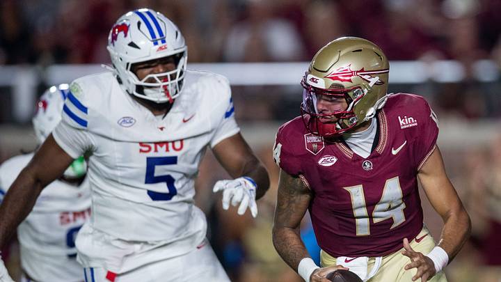 Florida State Seminoles quarterback Ashton Daniels (14) runs the ball. The SMU Mustangs lead the Florida State Seminoles 17-10 at the end of the first half Monday, Sept. 7, 2026.