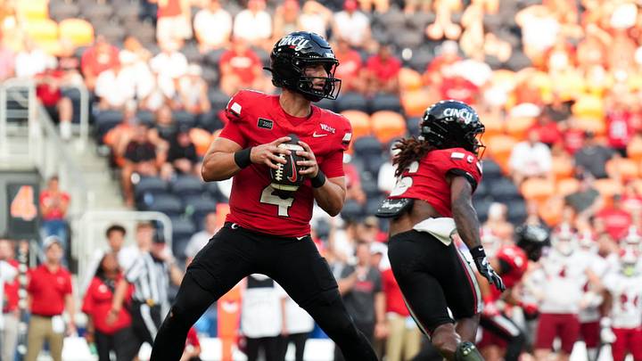 Sep 19, 2026; Cincinnati, Ohio, USA; Cincinnati Bearcats quarterback JC French IV (4) drops back to pass against the Miami (OH) RedHawks in the second half at TQL Stadium. Mandatory Credit: Aaron Doster-Imagn Images Sep 19, 2026; Cincinnati, Ohio, USA; Cincinnati Bearcats quarterback JC French IV (4) drops back to pass against the Miami (OH) RedHawks in the second half at TQL Stadium. Mandatory Credit: Aaron Doster-Imagn Images