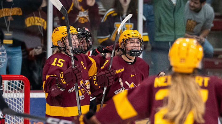 Gophers forward Ava Lindsay, center, celebrates her goal against St. Cloud State on Oct. 17, 2023, at Ridder Arena in Minneapolis. 