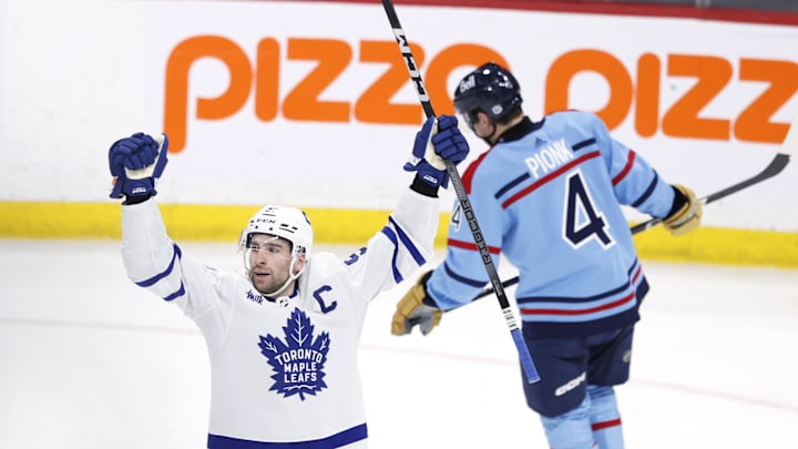 Jan 27, 2024; Winnipeg, Manitoba, CAN; Toronto Maple Leafs center John Tavares (91) celebrates his goal versus the Jets.
