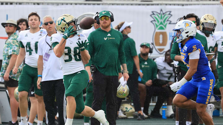 South Florida Bulls wide receiver Sean Atkins (38) pulls in a catch over San Jose State Spartans cornerback Jalen Bainer (15) during the first quarter at Clarence T.C. Ching Athletics Complex. Marco Garcia-Imagn Images