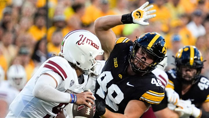 Iowa Hawkeyes defensive lineman Max Llewellyn (48) pressures Massachusetts Minutemen quarterback Grant Jordan (9) Sept. 13, 2025 at Kinnick Stadium in Iowa City, Iowa.
