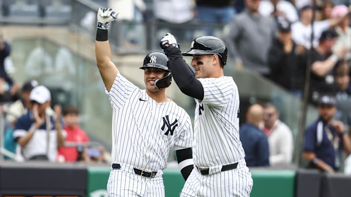 May 4, 2024; Bronx, New York, USA;  New York Yankees first baseman Anthony Rizzo (48) celebrates with second baseman Gleyber Torres (25) after hitting a three run home run in the third inning against the Detroit Tigers at Yankee Stadium. Mandatory Credit: Wendell Cruz-Imagn Images