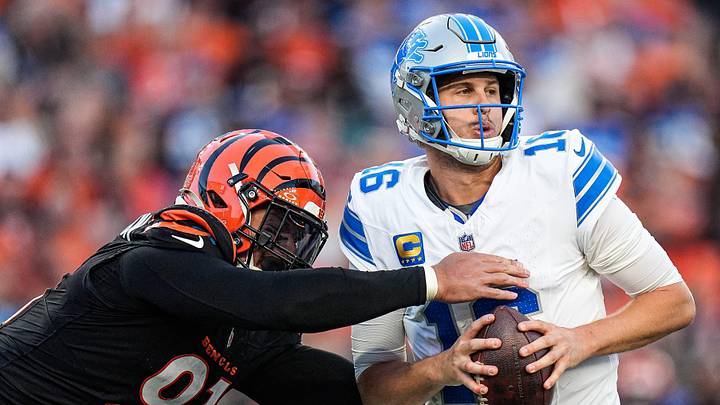 Detroit Lions quarterback Jared Goff (16) is sacked by Cincinnati Bengals defensive end Trey Hendrickson (91) during the second half at Paycor Stadium in Cincinnati on Sunday, Oct. 5, 2025.
