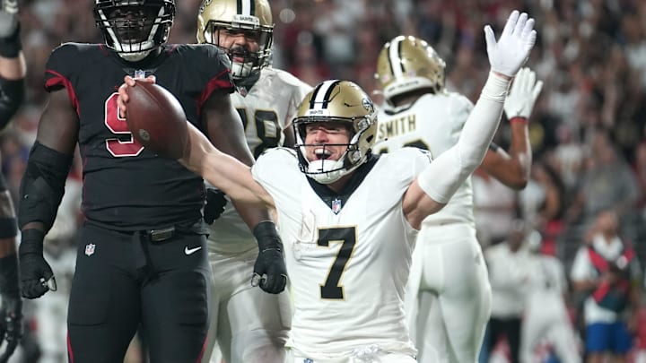 Oct 20, 2022; Glendale, Arizona, United States; New Orleans Saints tight end Taysom Hill (7) celebrates his rushing touchdown against the Arizona Cardinals at State Farm Stadium. Mandatory Credit: Joe Rondone-Arizona Republic

Nfl Cardinals Saints Photos New Orleans Saints At Arizona Cardinals