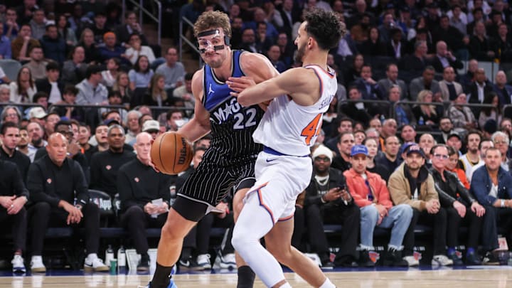 Nov 12, 2025; New York, New York, USA;  Orlando Magic forward Franz Wagner (22) looks to post up against New York Knicks guard Landry Shamet (44) in the fourth quarter at Madison Square Garden. Mandatory Credit: Wendell Cruz-Imagn Images