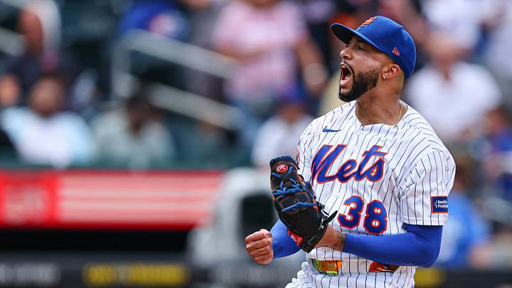 Mets pitcher Devin Williams (38) reacts after striking out Atlanta Braves third baseman Austin Riley. Mets pitcher Devin Williams (38) reacts after striking out Atlanta Braves third baseman Austin Riley.
