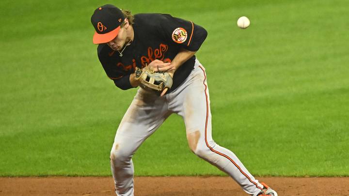 Sep 22, 2023; Cleveland, Ohio, USA; Baltimore Orioles shortstop Gunnar Henderson (2) commits a fielding error in the fourth inning against the Cleveland Guardians at Progressive Field. Mandatory Credit: David Richard-Imagn Images
