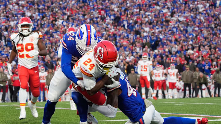 Nov 2, 2025; Orchard Park, New York, USA; Kansas City Chiefs running back Brashard Smith (24) is brought down by Buffalo Bills safety Cole Bishop (24) and cornerback Christian Benford (47) in the first quarter at Highmark Stadium. Mandatory Credit: Gregory Fisher-Imagn Images Nov 2, 2025; Orchard Park, New York, USA; Kansas City Chiefs running back Brashard Smith (24) is brought down by Buffalo Bills safety Cole Bishop (24) and cornerback Christian Benford (47) in the first quarter at Highmark Stadium. Mandatory Credit: Gregory Fisher-Imagn Images