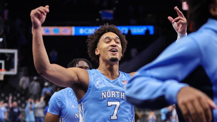 Dec 20, 2025; Atlanta, Georgia, USA; North Carolina Tar Heels guard Seth Trimble (7) celebrates after a victory over the Ohio State Buckeyes at State Farm Arena. Mandatory Credit: Brett Davis-Imagn Images
