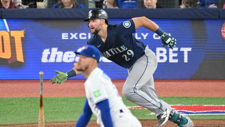 Seattle Mariners catcher Cal Raleigh (29) hits a double off of Toronto Blue Jays pitcher Jose Berrios (17) in the fifth inning at Rogers Centre on April 19.