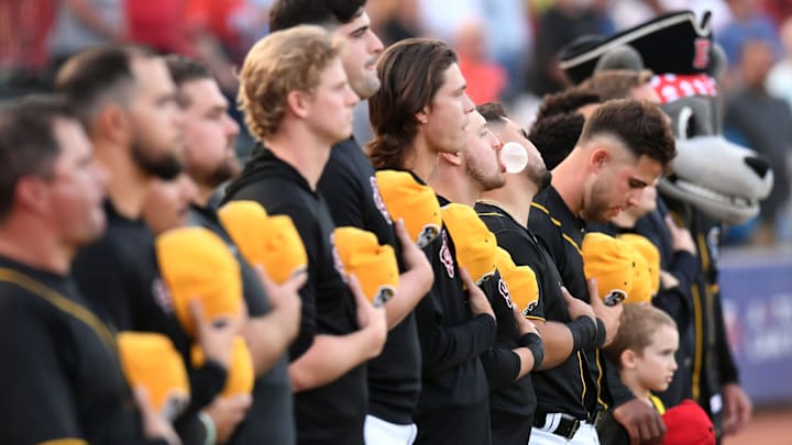 Erie SeaWolves teammates stand for the national anthem prior to a game against the Akron RubberDucks at UPMC Park in Erie on Sept. 20, 2024.