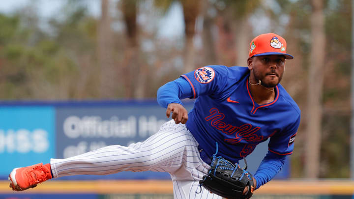 Feb 17, 2026; Port St. Lucie, FL, USA;  New York Mets pitcher Freddy Peralta (51) throws a pitch during the New York Mets spring training workouts at Clover Park. Mandatory Credit: Reinhold Matay-Imagn Images