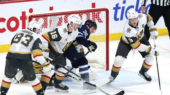 Mar 24, 2026; Winnipeg, Manitoba, CAN; Vegas Golden Knights center Jack Eichel (9) clears the puck away from Winnipeg Jets center Morgan Barron (36) in the third period at Canada Life Centre. Mandatory Credit: James Carey Lauder-Imagn Images Mar 24, 2026; Winnipeg, Manitoba, CAN; Vegas Golden Knights center Jack Eichel (9) clears the puck away from Winnipeg Jets center Morgan Barron (36) in the third period at Canada Life Centre. Mandatory Credit: James Carey Lauder-Imagn Images