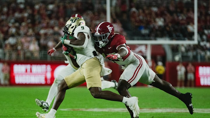 Sep 7, 2024; Tuscaloosa, Alabama, USA; Alabama Crimson Tide linebacker Justin Jefferson (15) dives for South Florida Bulls running back Ta'Ron Keith (9) as he runs the ball down the field during the fourth quarter at Bryant-Denny Stadium. Mandatory Credit: William McLelland-Imagn Images Sep 7, 2024; Tuscaloosa, Alabama, USA; Alabama Crimson Tide linebacker Justin Jefferson (15) dives for South Florida Bulls running back Ta'Ron Keith (9) as he runs the ball down the field during the fourth quarter at Bryant-Denny Stadium. Mandatory Credit: William McLelland-Imagn Images