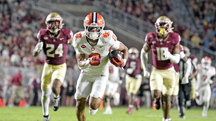 Oct 5, 2024; Tallahassee, Florida, USA; Clemson Tigers wide receiver Antonio Williams (0) scores a touchdown against the Florida State Seminoles during the first half at Doak S. Campbell Stadium. Mandatory Credit: Melina Myers-Imagn Images Oct 5, 2024; Tallahassee, Florida, USA; Clemson Tigers wide receiver Antonio Williams (0) scores a touchdown against the Florida State Seminoles during the first half at Doak S. Campbell Stadium. Mandatory Credit: Melina Myers-Imagn Images