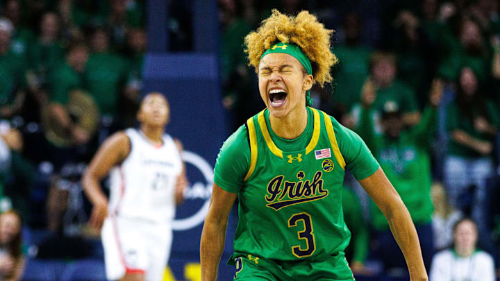 Notre Dame guard Hannah Hidalgo (3) celebrates scoring a three point shot during a NCAA women's basketball game between No. 8 Notre Dame and No. 2 UConn at Purcell Pavilion on Thursday, Dec. 12, 2024, in South Bend.