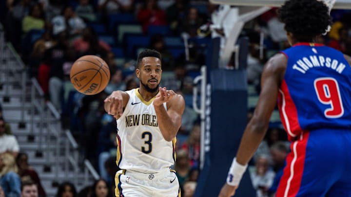 Nov 2, 2023; New Orleans, Louisiana, USA;  New Orleans Pelicans guard CJ McCollum (3) passes around the Detroit Pistons