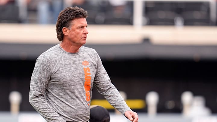 Oklahoma State head football coach Mike Gundy watches warm ups before the first half the college football game between the Oklahoma State Cowboys and the Arizona State Sun Devils at Boone Pickens Stadium in Stillwater, Okla., Saturday, Nov., 2, 2024. Oklahoma State head football coach Mike Gundy watches warm ups before the first half the college football game between the Oklahoma State Cowboys and the Arizona State Sun Devils at Boone Pickens Stadium in Stillwater, Okla., Saturday, Nov., 2, 2024.
