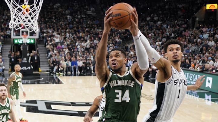 Jan 31, 2025; San Antonio, Texas, USA; Milwaukee Bucks forward Giannis Antetokounmpo (34) drives to the basket while defended by San Antonio Spurs center Victor Wembanyama (1) during the first half at Frost Bank Center. Mandatory Credit: Scott Wachter-Imagn Images