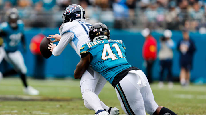 Jacksonville Jaguars defensive end Josh Hines-Allen (41) sacks Tennessee Titans quarterback Brandon Allen (10) during the first quarter in an NFL football matchup at EverBank Stadium, Sunday, Jan. 4, 2026, in Jacksonville, Fla. [Doug Engle/Florida Times-Union]