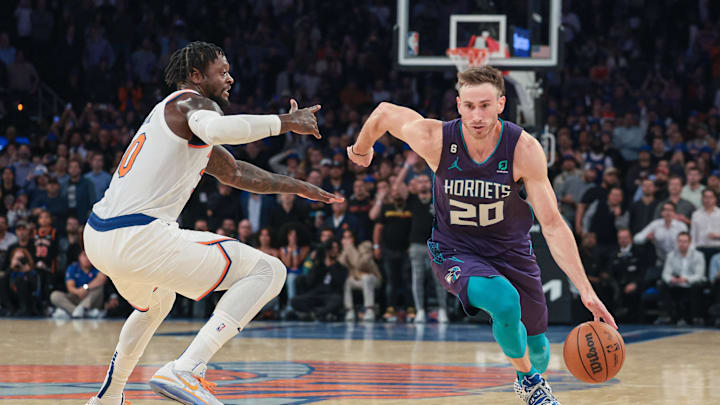 Oct 26, 2022; New York, New York, USA; Charlotte Hornets forward Gordon Hayward (20) drives to the basket as New York Knicks forward Julius Randle (30) defends during the fourth quarter at Madison Square Garden. Mandatory Credit: Vincent Carchietta-USA TODAY Sports