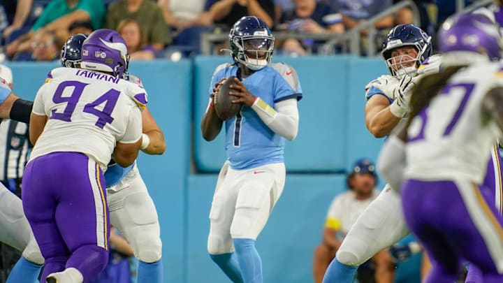 Tennessee Titans quarterback Cam Ward (1) looks for a receiver during the first quarter of an NFL pre-season game against the Minnesota Vikings at Nissan Stadium in Nashville, Tenn., Friday, Aug. 22, 2025.
