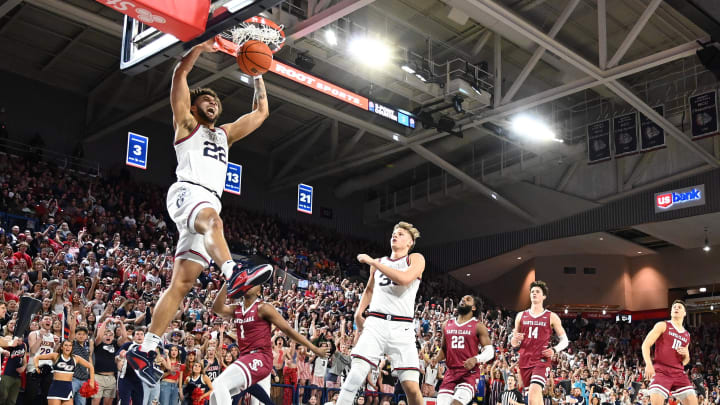 Feb 24, 2024; Spokane, Washington, USA; Gonzaga Bulldogs forward Anton Watson (22) dunks the ball against Santa Clara Broncos guard Tyeree Bryan (1) in the first half at McCarthey Athletic Center. Mandatory Credit: James Snook-USA TODAY Sports
