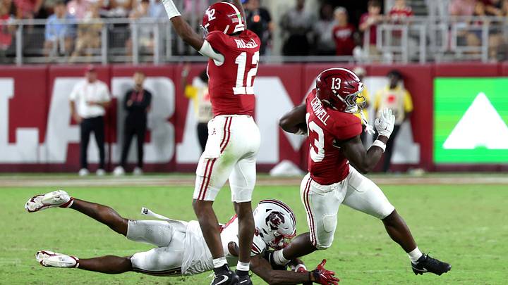 Sep 26, 2026; Tuscaloosa, Alabama, USA; Alabama Crimson Tide running back EJ Crowell (13) avoids a tackle from South Carolina Gamecocks defensive back Judge Collier (8) during the second half at Saban Field at Bryant-Denny Stadium. Mandatory Credit: David Leong-Imagn Images Sep 26, 2026; Tuscaloosa, Alabama, USA; Alabama Crimson Tide running back EJ Crowell (13) avoids a tackle from South Carolina Gamecocks defensive back Judge Collier (8) during the second half at Saban Field at Bryant-Denny Stadium. Mandatory Credit: David Leong-Imagn Images