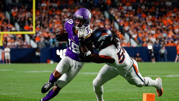 Aug 28, 2026; Denver, Colorado, USA; Minnesota Vikings wide receiver Dontae Fleming (19) is pushed out of bounds by Denver Broncos linebacker Jordan Turner (55) in the second quarter at Empower Field at Mile High.  