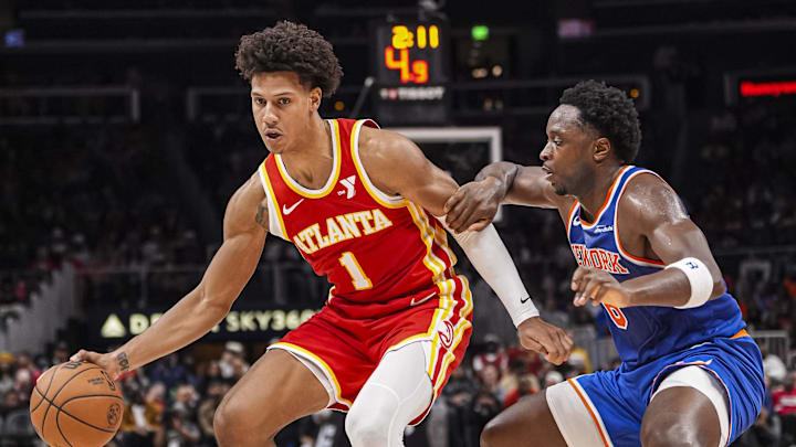 Nov 6, 2024; Atlanta, Georgia, USA; Atlanta Hawks forward Jalen Johnson (1) dribbles against New York Knicks forward OG Anunoby (8) during the second half at State Farm Arena. Mandatory Credit: Dale Zanine-Imagn Images Nov 6, 2024; Atlanta, Georgia, USA; Atlanta Hawks forward Jalen Johnson (1) dribbles against New York Knicks forward OG Anunoby (8) during the second half at State Farm Arena. Mandatory Credit: Dale Zanine-Imagn Images