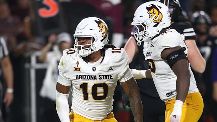 Sep 6, 2025; Starkville, Mississippi, USA; Arizona State Sun Devils defensive lineman Clayton Smith (10) and defensive lineman Ramar Williams (55) react after a defensive stop during the second quarter against the Mississippi State Bulldogs at Davis Wade Stadium at Scott Field. Mandatory Credit: Petre Thomas-Imagn Images
