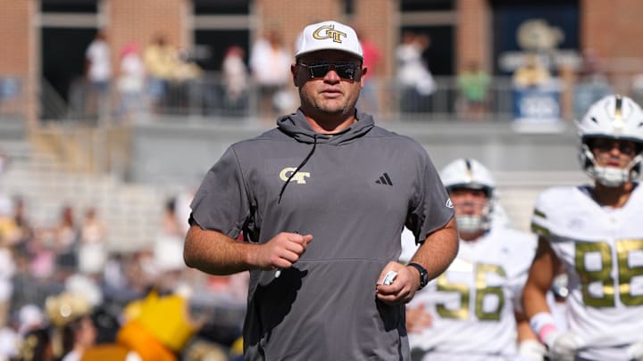 Oct 11, 2025; Atlanta, Georgia, USA; Georgia Tech Yellow Jackets head coach Brent Key runs on the field before a game against the Virginia Tech Hokies at Bobby Dodd Stadium at Hyundai Field. Mandatory Credit: Brett Davis-Imagn Images