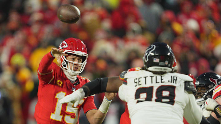 Jan 18, 2025; Kansas City, Missouri, USA; Kansas City Chiefs quarterback Patrick Mahomes (15) throws a pass against Houston Texans defensive tackle Tim Settle Jr. (98) during the third quarter of a 2025 AFC divisional round game at GEHA Field at Arrowhead Stadium. Mandatory Credit: Jay Biggerstaff-Imagn Images Jan 18, 2025; Kansas City, Missouri, USA; Kansas City Chiefs quarterback Patrick Mahomes (15) throws a pass against Houston Texans defensive tackle Tim Settle Jr. (98) during the third quarter of a 2025 AFC divisional round game at GEHA Field at Arrowhead Stadium. Mandatory Credit: Jay Biggerstaff-Imagn Images