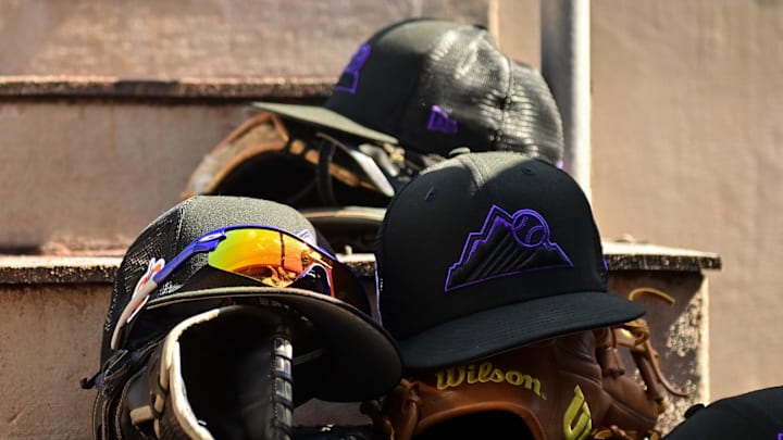 MColorado Rockies hats, gloves 