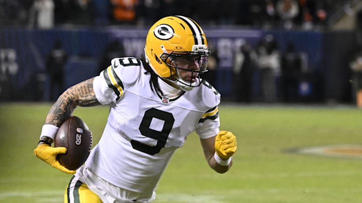 Jan 10, 2026; Chicago, IL, USA;  Green Bay Packers wide receiver Christian Watson (9) runs after the catch against the Chicago Bears during the first half of an NFC Wild Card Round game at Soldier Field. Mandatory Credit: Matt Marton-Imagn Images