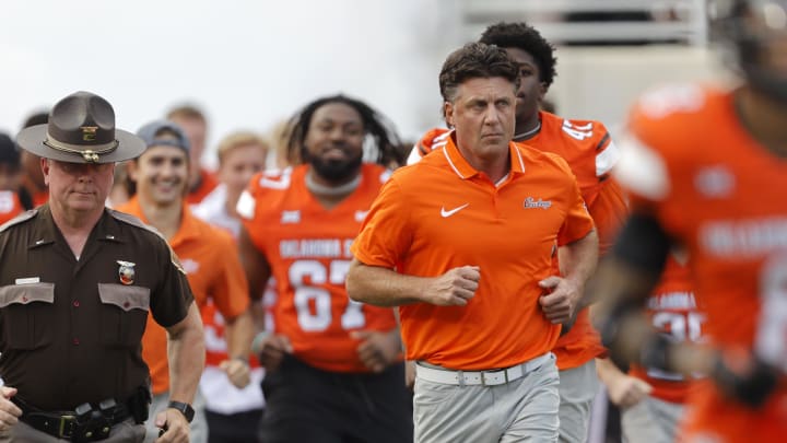 Sep 16, 2023; Stillwater, Oklahoma, USA; Oklahoma State coach Mike Gundy takes the field before an NCAA football game between Oklahoma State and South Alabama at Boone Pickens Stadium. South Alabama won 33-7. Mandatory Credit: Bryan Terry-USA TODAY Sports Sep 16, 2023; Stillwater, Oklahoma, USA; Oklahoma State coach Mike Gundy takes the field before an NCAA football game between Oklahoma State and South Alabama at Boone Pickens Stadium. South Alabama won 33-7. Mandatory Credit: Bryan Terry-USA TODAY Sports