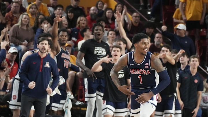 Feb 1, 2025; Tempe, Ariz., U.S.; Arizona Wildcats guard Caleb Love (1) reacts after sinking a 3-point shot during a Big 12 menÕs basketball game against the Arizona State Sun Devils at Desert Financial Arena.