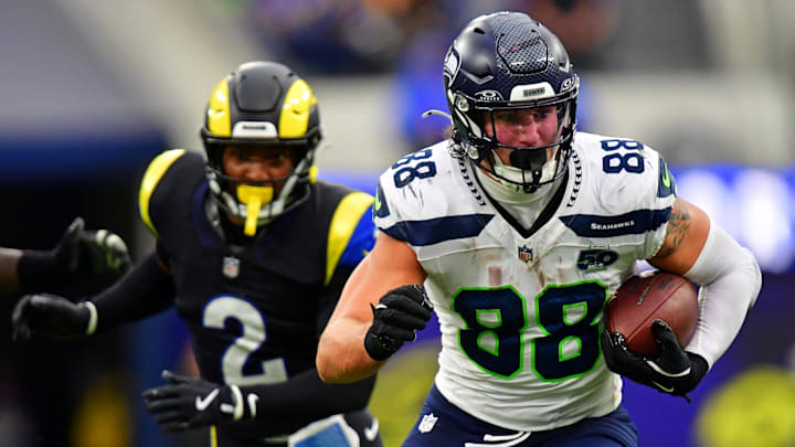 Nov 16, 2025; Inglewood, California, USA; Seattle Seahawks tight end AJ Barner (88) runs with the ball during the second half against the Los Angeles Rams at SoFi Stadium. Mandatory Credit: Gary A. Vasquez-Imagn Images