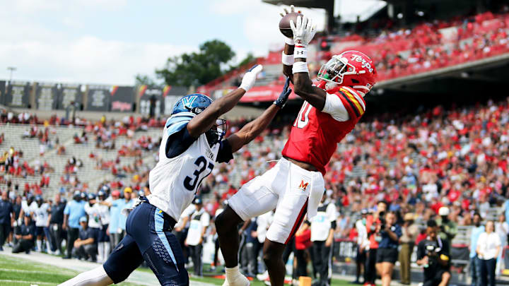 Sep 21, 2024; College Park, Maryland, USA; Maryland Terrapins wide receiver Tai Felton (10) makes a touchdown catch over Villanova Wildcats defensive back Zahmir Dawud (37) during the third quarter at SECU Stadium. Mandatory Credit: Daniel Kucin Jr.-Imagn Images
Sep 21, 2024; College Park, Maryland, USA; Maryland Terrapins wide receiver Tai Felton (10) makes a touchdown catch over Villanova Wildcats defensive back Zahmir Dawud (37) during the third quarter at SECU Stadium. Mandatory Credit: Daniel Kucin Jr.-Imagn Images