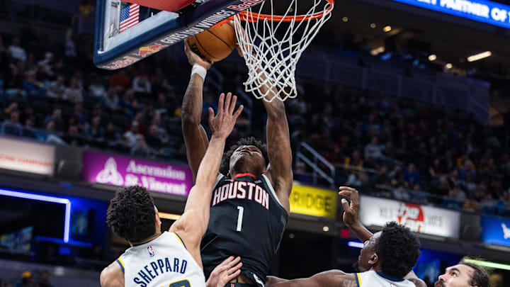 Mar 4, 2025; Indianapolis, Indiana, USA; Houston Rockets forward Amen Thompson (1) shoots the ball while Indiana Pacers guard Ben Sheppard (26) defends in the first half at Gainbridge Fieldhouse. Mandatory Credit: Trevor Ruszkowski-Imagn Images