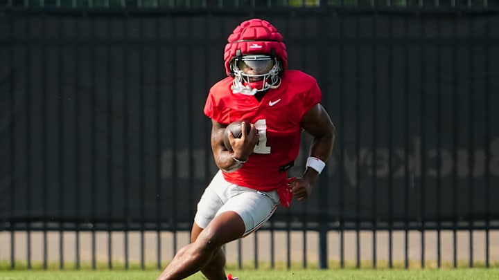 Aug 8, 2024; Columbus, Ohio, USA; Ohio State Buckeyes running back Quinshon Judkins (1) carries the ball during football practice at the Woody Hayes Athletic Complex. Aug 8, 2024; Columbus, Ohio, USA; Ohio State Buckeyes running back Quinshon Judkins (1) carries the ball during football practice at the Woody Hayes Athletic Complex.
