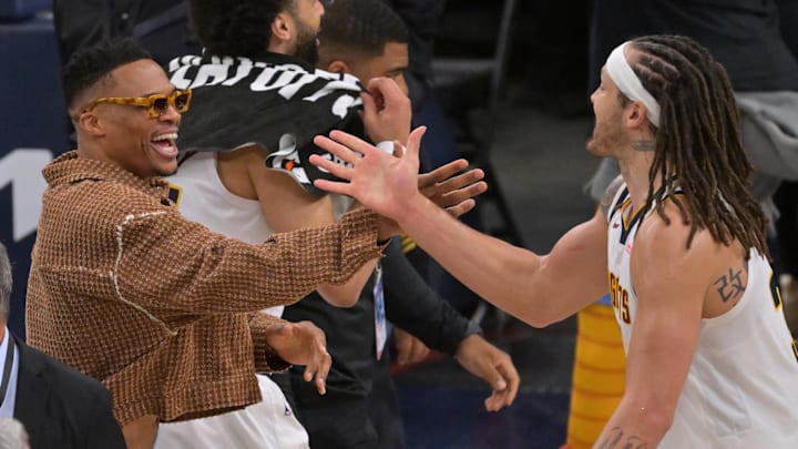Apr 26, 2025; Inglewood, California, USA; Denver Nuggets forward Aaron Gordon (32) is congratulated by guard Russell Westbrook (4) after the game winning dunk to defeat the Los Angeles Clippers 101-99 in game four of round one of the 2024 NBA Playoffs at Intuit Dome. Mandatory Credit: Jayne Kamin-Oncea-Imagn Images