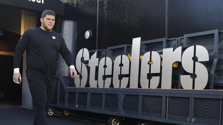 Dec 8, 2024; Pittsburgh, Pennsylvania, USA;  Pittsburgh Steelers center Zach Frazier (54) takes the field to warm up against the Cleveland Browns at Acrisure Stadium. Mandatory Credit: Charles LeClaire-Imagn Images