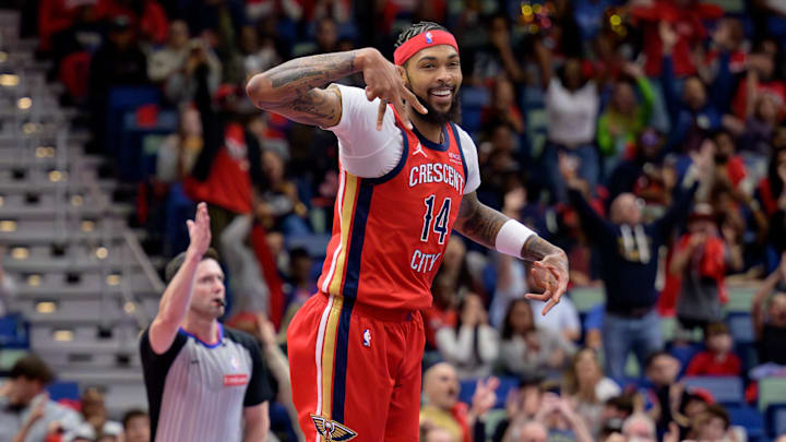Nov 15, 2024; New Orleans, Louisiana, USA; New Orleans Pelicans forward Brandon Ingram (14) celebrates a three point basket against the Denver Nuggets during the first half at Smoothie King Center. Mandatory Credit: Matthew Hinton-Imagn Images Nov 15, 2024; New Orleans, Louisiana, USA; New Orleans Pelicans forward Brandon Ingram (14) celebrates a three point basket against the Denver Nuggets during the first half at Smoothie King Center. Mandatory Credit: Matthew Hinton-Imagn Images