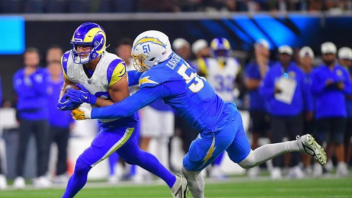 Aug 27, 2026; Inglewood, California, USA; Los Angeles Rams tight end Mark Redman (83) runs the ball against Los Angeles Chargers linebacker Andre Carter II (51) during the first half at SoFi Stadium. Mandatory Credit: Gary A. Vasquez-Imagn Images Aug 27, 2026; Inglewood, California, USA; Los Angeles Rams tight end Mark Redman (83) runs the ball against Los Angeles Chargers linebacker Andre Carter II (51) during the first half at SoFi Stadium. Mandatory Credit: Gary A. Vasquez-Imagn Images