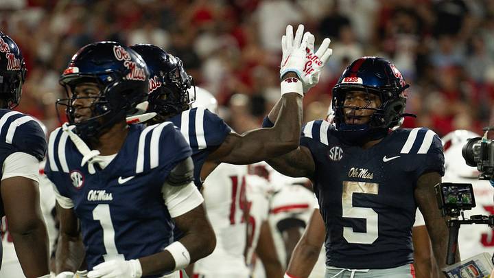 Sep 6, 2026; Nashville, Tennessee, USA; Ole Miss Rebels running back Kewan Lacy (5) celebrates with his teammates after scoring a touchdown against the Louisville Cardinals during the first half at Nissan Stadium. Mandatory Credit: Steve Roberts-Imagn Images Sep 6, 2026; Nashville, Tennessee, USA; Ole Miss Rebels running back Kewan Lacy (5) celebrates with his teammates after scoring a touchdown against the Louisville Cardinals during the first half at Nissan Stadium. Mandatory Credit: Steve Roberts-Imagn Images